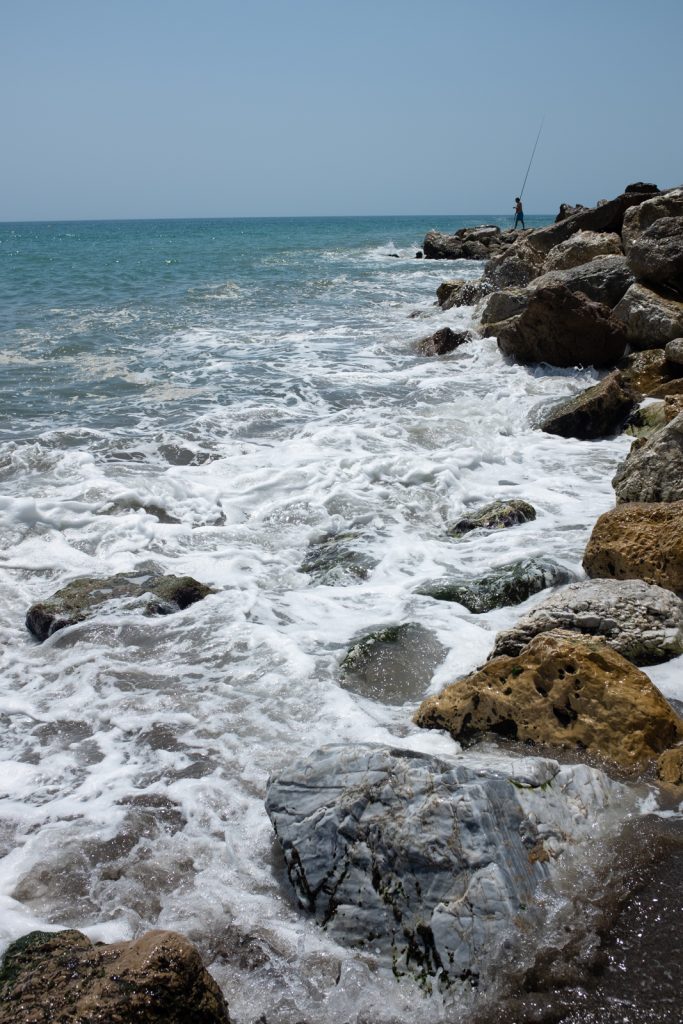 The fisherman. Never saw this guy catch anything, but he was tenacious and stood there for hours.