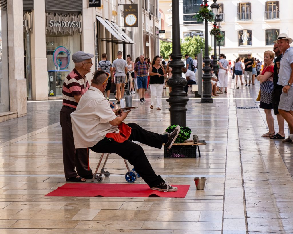 The typical street performers were, of course, present, but they also need a break. Still, it removed some of the magic from the performance as the metal rod poked out of the back of his shirt.